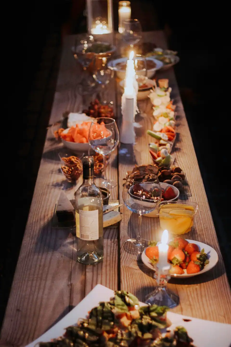 A long table set with shared dishes