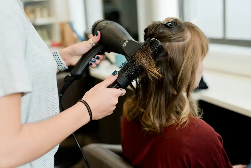 A blow-out in progress with a round brush