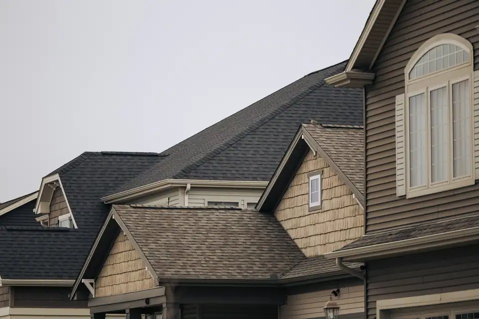Homes with new brown architectural shingles